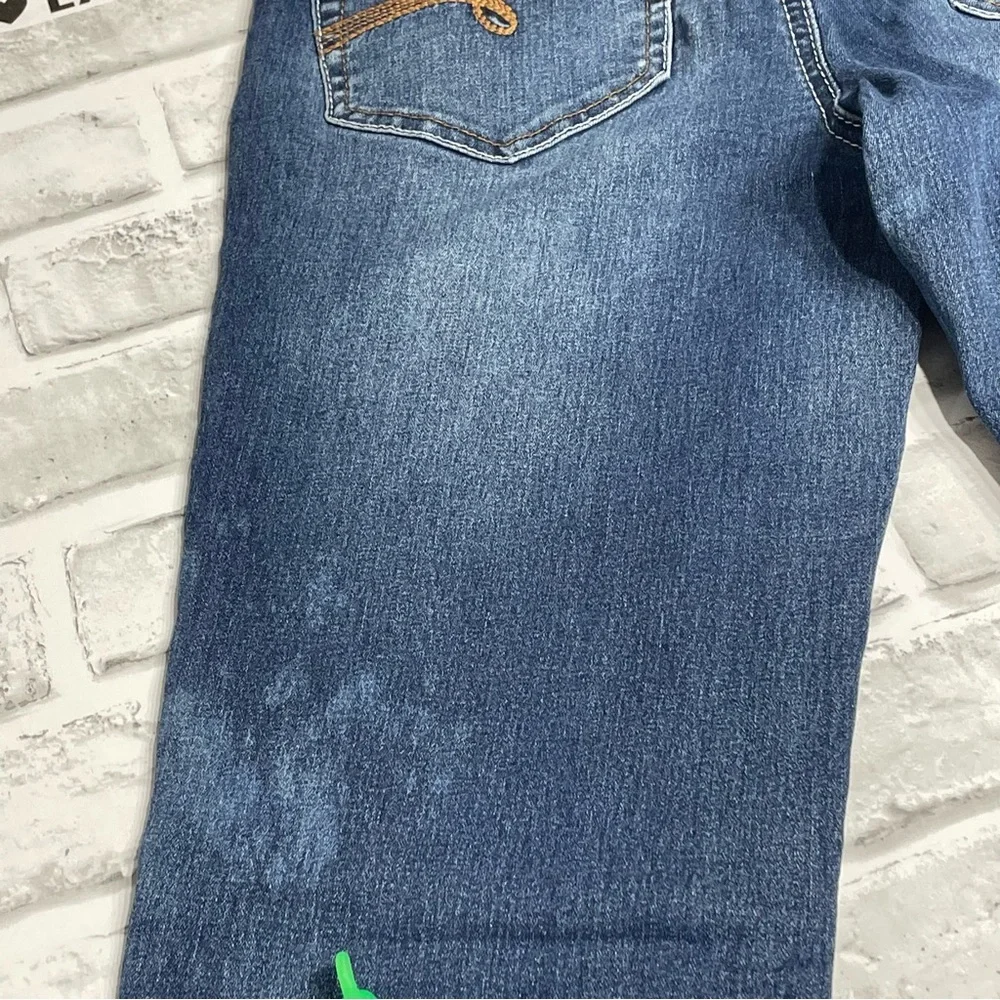 Justice Premium Blue Jeans. Simply low skinny Girls size 16R. Spots. Pre-owned.